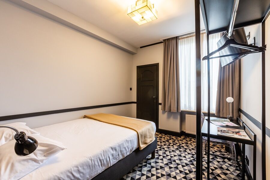 호텔 르 샤틀랭 브뤼셀 외부 사진 A room at the hotel